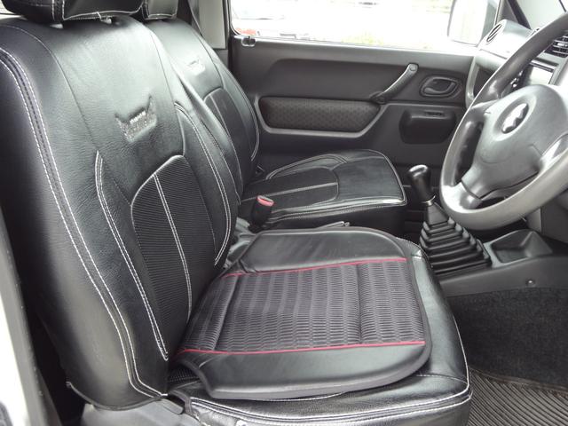 ジムニー ＸＣ　インタークーラーターボ　５速ミッション　４ＷＤ　リフトアップ　純正アルミ　社外マフラー　ナビ　テレビ　サイドシルガード（12枚目）