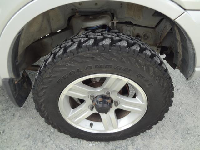 ジムニー ＸＣ　インタークーラーターボ　５速ミッション　４ＷＤ　リフトアップ　純正アルミ　社外マフラー　ナビ　テレビ　サイドシルガード（17枚目）