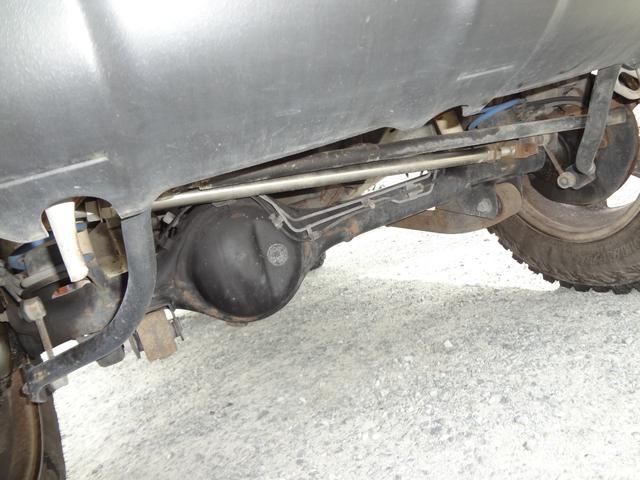 ジムニー ＸＣ　インタークーラーターボ　５速ミッション　４ＷＤ　リフトアップ　純正アルミ　社外マフラー　ナビ　テレビ　サイドシルガード（18枚目）