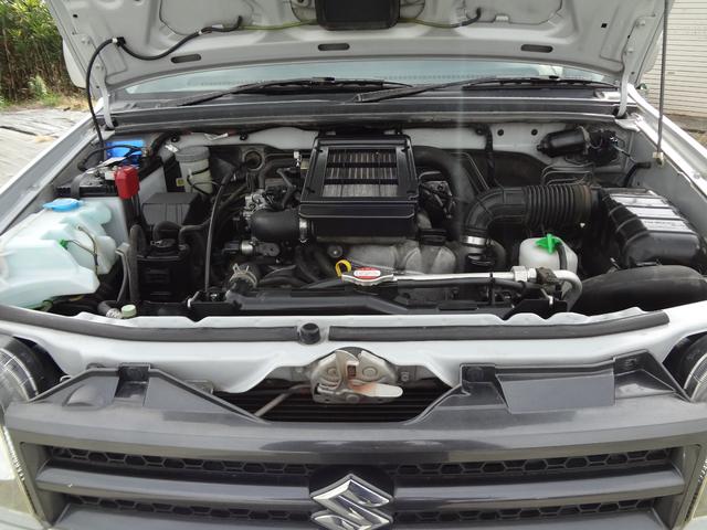 ジムニー ＸＣ　インタークーラーターボ　５速ミッション　４ＷＤ　リフトアップ　純正アルミ　社外マフラー　ナビ　テレビ　サイドシルガード（20枚目）