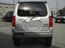 ジムニー ＸＣ　インタークーラーターボ　５速ミッション　４ＷＤ　リフトアップ　純正アルミ　社外マフラー　ナビ　テレビ　サイドシルガード（7枚目）