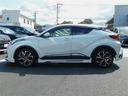 C-HR G スマートキ- Bカメラ 横滑り防止 メディアプレイヤー接続 ハーフレザー オートエアコン LEDヘッドライト クルコン パワーウインドウ フルセグTV エアロ アルミホイール エアバッグ ABS TV 中古車画像_3
