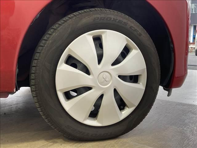 eKワゴン E オーディオ 電動格納ドアミラー キーレス ETC シートヒーター パワーウィンドウ パワーステアリング ABS ベンチシート 純正ホイールキャップ(15枚目)