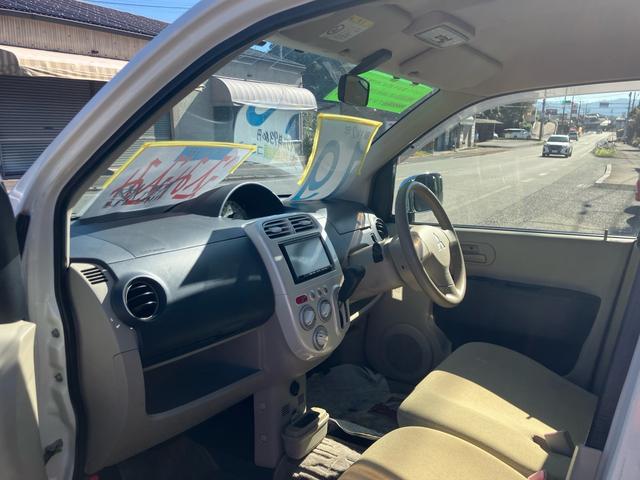 eKワゴン M ナビ テレビ タイミングベルト交換済 キーレスエントリー 盗難防止システム 衝突安全ボディ CD再生可能 エアコン(24枚目)