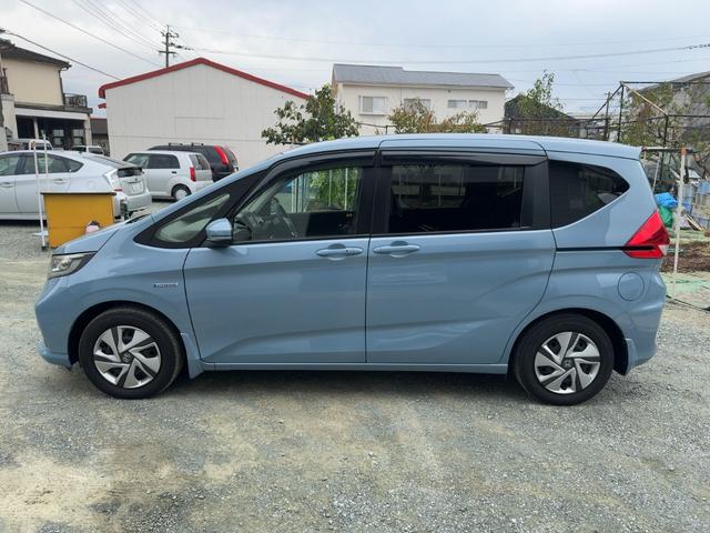 フリードハイブリッド ハイブリッド・Ｇホンダセンシング　キーフリー　プッシュスタート　純正ナビ　フルセグテレビ　ＣＤＤＶＤ再生　ブルートゥースオーディオ　ＥＴＣ　バックカメラ　シートヒーター　両側パワースライドドア　ＬＥＤヘッドライト（9枚目）