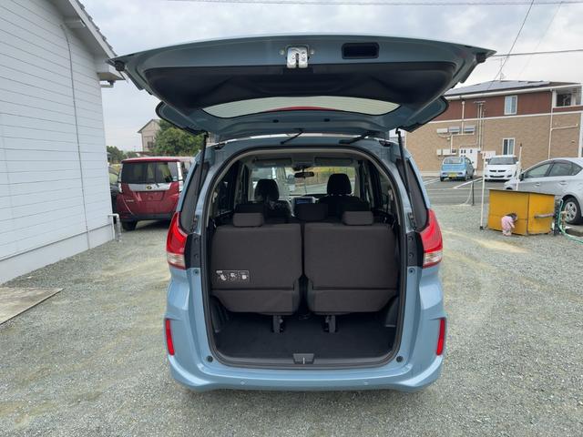 フリードハイブリッド ハイブリッド・Ｇホンダセンシング　キーフリー　プッシュスタート　純正ナビ　フルセグテレビ　ＣＤＤＶＤ再生　ブルートゥースオーディオ　ＥＴＣ　バックカメラ　シートヒーター　両側パワースライドドア　ＬＥＤヘッドライト（31枚目）