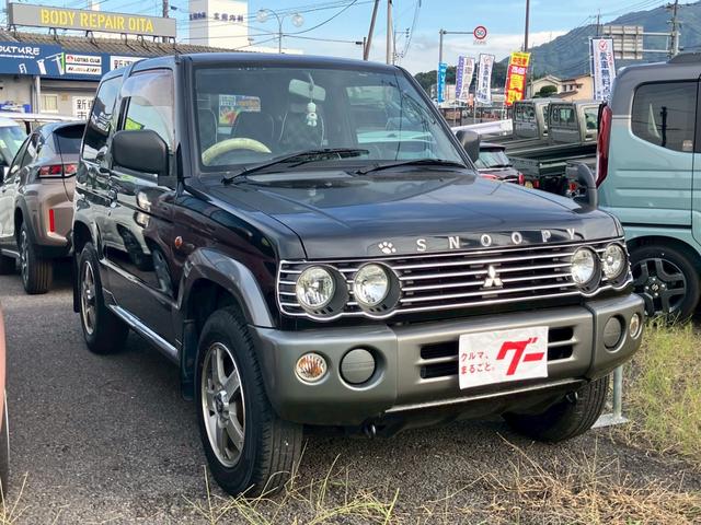 パジェロミニ スヌーピーエディションII ナビ・地デジTV・DVD再生・Bluetoothオーディオ・背面タイヤカバー・キーレス・アルミホイール・Wエアバッグ(4枚目)