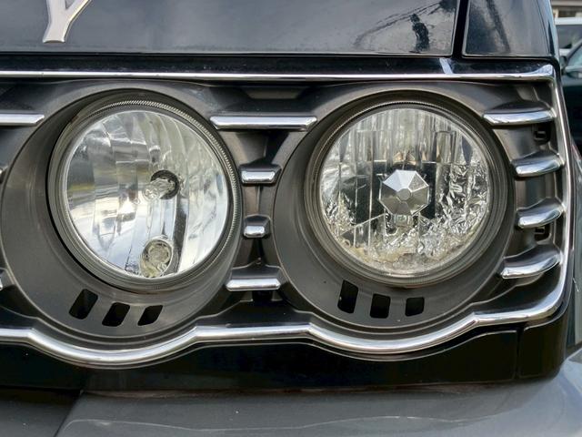 パジェロミニ スヌーピーエディションII ナビ・地デジTV・DVD再生・Bluetoothオーディオ・背面タイヤカバー・キーレス・アルミホイール・Wエアバッグ(6枚目)