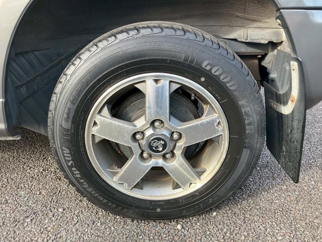 パジェロミニ スヌーピーエディションII ナビ・地デジTV・DVD再生・Bluetoothオーディオ・背面タイヤカバー・キーレス・アルミホイール・Wエアバッグ(12枚目)