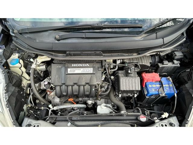 フィットシャトルハイブリッド ハイブリッド　クールエディション　ハーフレザーシート　ギャザーズナビ　ＴＶ＆ナビ　バックカメラ　シートヒーター　ＥＴＣ　キーレスエントリー　横滑り防止機能　アイドリングストップ　盗難防止システム　衝突安全ボディ（25枚目）