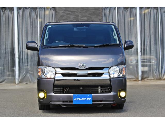 レジアスエースバン スーパーＧＬ　ダークプライム　・衝突回避支援ブレーキ・レーンキープアシスト・社外ＳＤナビ・ＤＴＶ・バックモニター・Ｂｌｕｅｔｏｏｔ・ＤＶＤ・ＣＤ・ＥＴＣ・フリップダウンモニター・スマートキー・シートカバー・ベットキット・ローダウン（2枚目）