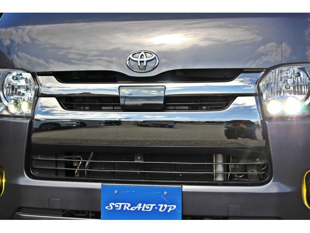 レジアスエースバン スーパーＧＬ　ダークプライム　・衝突回避支援ブレーキ・レーンキープアシスト・社外ＳＤナビ・ＤＴＶ・バックモニター・Ｂｌｕｅｔｏｏｔ・ＤＶＤ・ＣＤ・ＥＴＣ・フリップダウンモニター・スマートキー・シートカバー・ベットキット・ローダウン（7枚目）