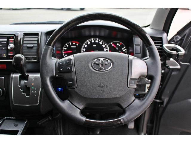 レジアスエースバン スーパーＧＬ　ダークプライム　・衝突回避支援ブレーキ・レーンキープアシスト・社外ＳＤナビ・ＤＴＶ・バックモニター・Ｂｌｕｅｔｏｏｔ・ＤＶＤ・ＣＤ・ＥＴＣ・フリップダウンモニター・スマートキー・シートカバー・ベットキット・ローダウン（26枚目）