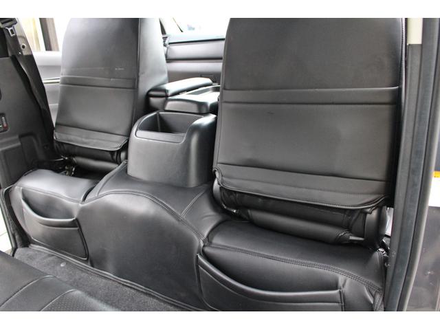 レジアスエースバン スーパーＧＬ　ダークプライム　・衝突回避支援ブレーキ・レーンキープアシスト・社外ＳＤナビ・ＤＴＶ・バックモニター・Ｂｌｕｅｔｏｏｔ・ＤＶＤ・ＣＤ・ＥＴＣ・フリップダウンモニター・スマートキー・シートカバー・ベットキット・ローダウン（54枚目）