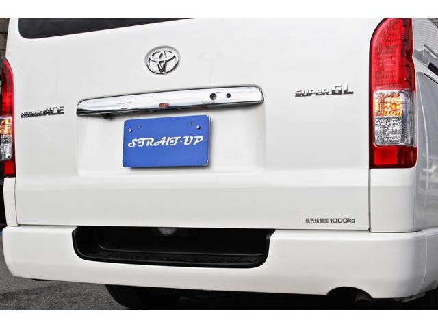 レジアスエースバン スーパーＧＬ　鑑定済車輌・衝突回避支援ブレーキ・車線逸脱機能・純正ＳＤナビ・ＤＴＶ・バックモニター・Ｂｌｕｅｔｏｏｔｈ・前後ドライブレコーダー・スマートキー・両側パワースライド・ベットキット・ローダウン・１７ＡＷ（19枚目）