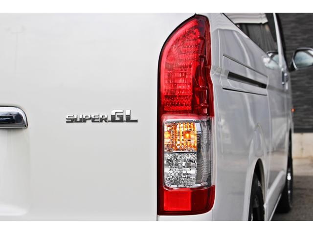 レジアスエースバン スーパーＧＬ　鑑定済車輌・衝突回避支援ブレーキ・車線逸脱機能・純正ＳＤナビ・ＤＴＶ・バックモニター・Ｂｌｕｅｔｏｏｔｈ・前後ドライブレコーダー・スマートキー・両側パワースライド・ベットキット・ローダウン・１７ＡＷ（20枚目）