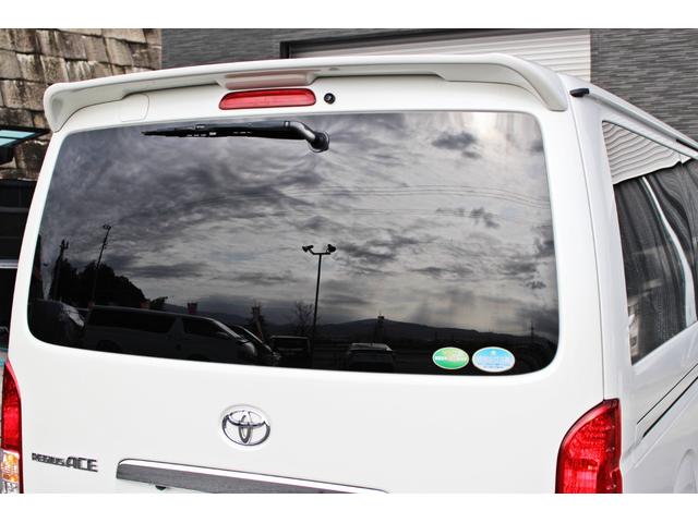 レジアスエースバン スーパーＧＬ　鑑定済車輌・衝突回避支援ブレーキ・車線逸脱機能・純正ＳＤナビ・ＤＴＶ・バックモニター・Ｂｌｕｅｔｏｏｔｈ・前後ドライブレコーダー・スマートキー・両側パワースライド・ベットキット・ローダウン・１７ＡＷ（21枚目）