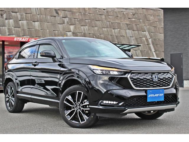 ヴェゼル ｅ：ＨＥＶ　Ｚ　・衝突回避軽減ブレーキ・誤発信抑制機能・純正９インチナビ・ＤＴＶ・バックカメラ・前後ドライブレコーダー・ＤＶＤ・ＣＤ・Ｂｌｕｅｔｏｏｔ・ＵＳＢ・ＥＴＣ・電動ブレーキ・ハンドルヒーター・パワーバックドア（3枚目）