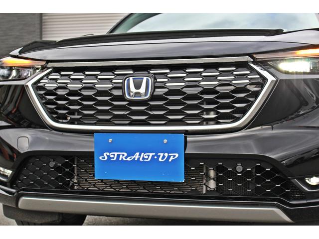 ヴェゼル ｅ：ＨＥＶ　Ｚ　・衝突回避軽減ブレーキ・誤発信抑制機能・純正９インチナビ・ＤＴＶ・バックカメラ・前後ドライブレコーダー・ＤＶＤ・ＣＤ・Ｂｌｕｅｔｏｏｔ・ＵＳＢ・ＥＴＣ・電動ブレーキ・ハンドルヒーター・パワーバックドア（7枚目）