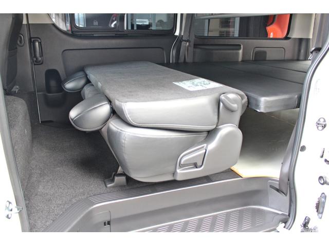 レジアスエースバン スーパーＧＬ　ダークプライム　純正ＳＤナビ・ＤＴＶ・バックモニター・Ｂｌｕｅｔｏｏｔｈ・ＥＴＣ・ＤＶＤ・ＣＤ・スマートキー・ハーフレザーシート・オートライト・ベットキット・リアゲートアシストグリップ・ＬＥＤライト・排出ガス洗浄装置（52枚目）