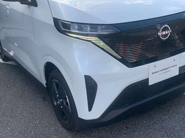 サクラ Ｘ　衝突被害軽減ブレーキ　社用車ＵＰ　ピュア電　運転席エアバック　ＡＡＣ　ＬＥＤヘッドランプ　試乗車　スマートキー　レーンアシスト　盗難防止システム　禁煙車　キーレスエントリー　バックモニター　パワーステアリング　アルミホイール　ＡＢＳ　ワンセグ（5枚目）