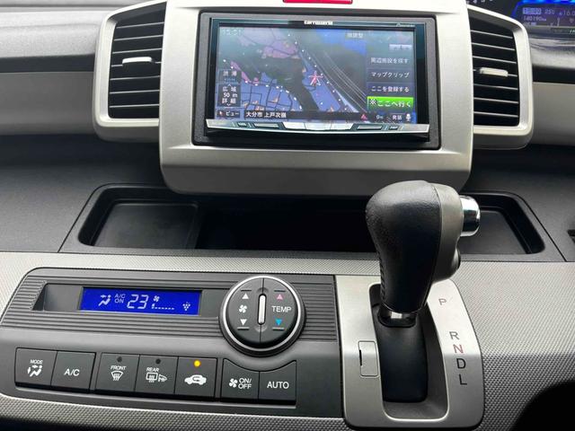 フリードハイブリッド ジャストセレクション ETC バックカメラ ナビ TV オートクルーズコントロール 両側電動スライドドア HID スマートキー 電動格納ミラー 3列シート CVT アルミホイール CD USB ミュージックプレイヤー接続可(3枚目)