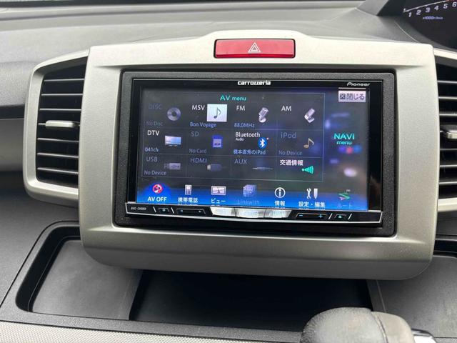 フリードハイブリッド ジャストセレクション ETC バックカメラ ナビ TV オートクルーズコントロール 両側電動スライドドア HID スマートキー 電動格納ミラー 3列シート CVT アルミホイール CD USB ミュージックプレイヤー接続可(5枚目)