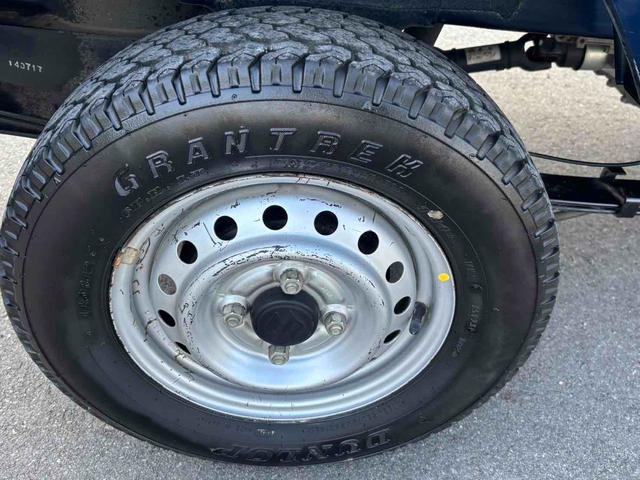 キャリイトラック ＫＣスペシャル　４ＷＤ　軽トラック　ＭＴ　衝突被害軽減システム　レーンアシスト　キーレスエントリー　オートライト　ＥＳＣ　エアコン　パワーステアリング　パワーウィンドウ　運転席エアバッグ　助手席エアバッグ（19枚目）