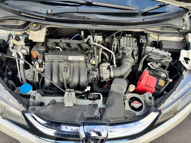 フィットハイブリッド Ｌパッケージ　ハイブリッド　バックカメラ　ＴＶ　オートクルーズコントロール　衝突被害軽減システム　ＬＥＤヘッドランプ　スマートキー　電動格納ミラー　ＡＴ　盗難防止システム　衝突安全ボディ　ＡＢＳ　ＥＳＣ　エアコン（16枚目）