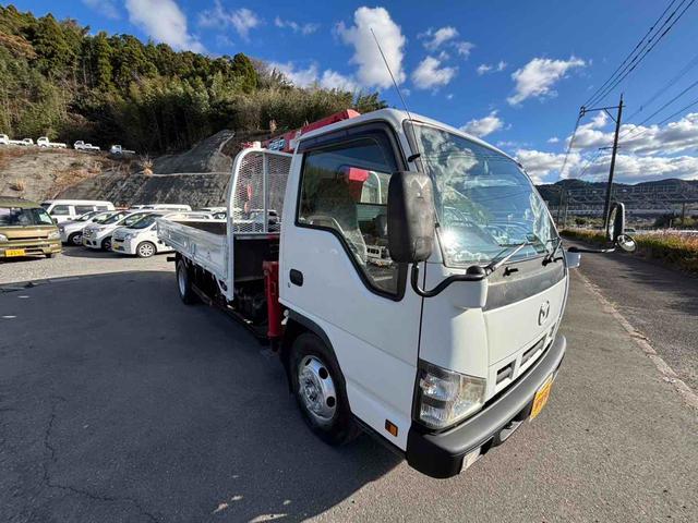 タイタントラック 　ＭＴ　後輪ダブル　電動格納ミラー　エアコン　運転席エアバッグ（2枚目）