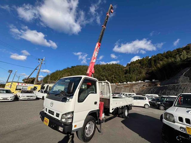 タイタントラック 　ＭＴ　後輪ダブル　電動格納ミラー　エアコン　運転席エアバッグ（3枚目）