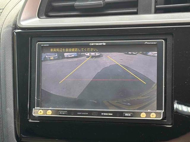 フィットハイブリッド Lパッケージ ハイブリッド ETC バックカメラ ナビ TV オートクルーズコントロール オートライト LEDヘッドランプ スマートキー 電動格納ミラー AT 盗難防止システム 衝突安全ボディ CD USB(4枚目)