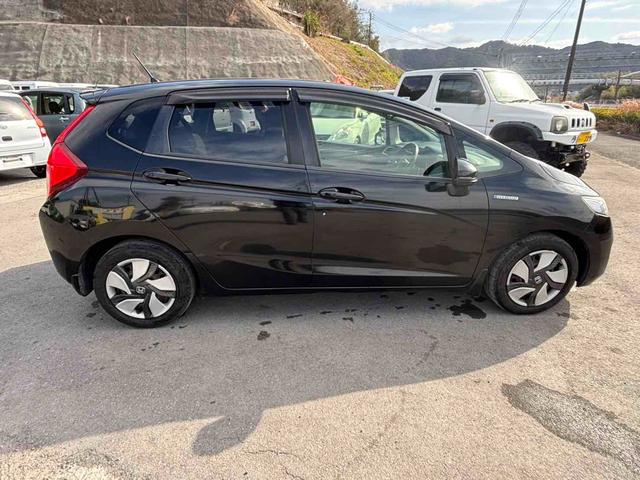 フィットハイブリッド Lパッケージ ハイブリッド ETC バックカメラ ナビ TV オートクルーズコントロール オートライト LEDヘッドランプ スマートキー 電動格納ミラー AT 盗難防止システム 衝突安全ボディ CD USB(14枚目)