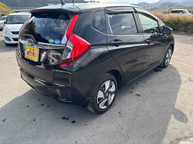 フィットハイブリッド Lパッケージ ハイブリッド ETC バックカメラ ナビ TV オートクルーズコントロール オートライト LEDヘッドランプ スマートキー 電動格納ミラー AT 盗難防止システム 衝突安全ボディ CD USB(15枚目)