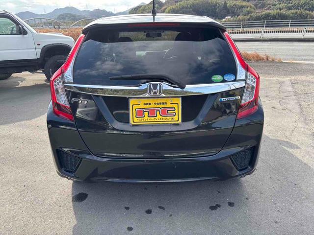 フィットハイブリッド Lパッケージ ハイブリッド ETC バックカメラ ナビ TV オートクルーズコントロール オートライト LEDヘッドランプ スマートキー 電動格納ミラー AT 盗難防止システム 衝突安全ボディ CD USB(16枚目)