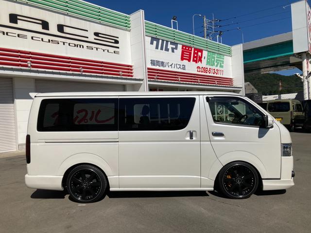 ハイエースバン スーパーGL ダークプライムII レガンスフロントエアロ ギブソンサイドリアバンパー エムテクノバットフェイスボンネット バックギャモン20インチAW ローダウン LEDテールランプ ディーゼルターボ(6枚目)