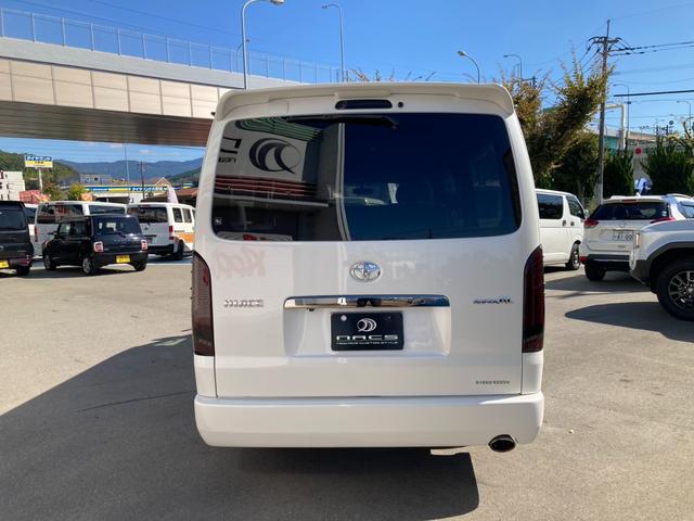 ハイエースバン スーパーGL ダークプライムII レガンスフロントエアロ ギブソンサイドリアバンパー エムテクノバットフェイスボンネット バックギャモン20インチAW ローダウン LEDテールランプ ディーゼルターボ(8枚目)