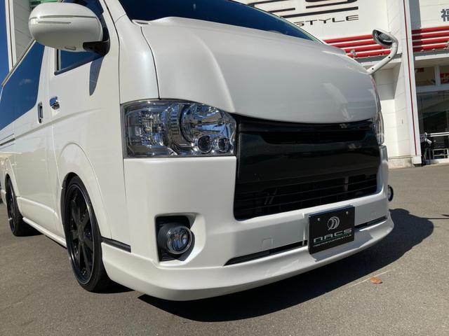 ハイエースバン スーパーGL ダークプライムII レガンスフロントエアロ ギブソンサイドリアバンパー エムテクノバットフェイスボンネット バックギャモン20インチAW ローダウン LEDテールランプ ディーゼルターボ(16枚目)