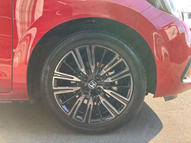 フィット ｅ：ＨＥＶホーム　２０周年特別仕様車　カーサ　純正ナビ　フルセグテレビ　バックカメラ　ＥＴＣ　ＬＥＤヘッドライト　クリアランスソナー　シートヒーター　Ｂｌｕｅｔｏｏｔｈ接続　ドライブレコーダー　オートクルーズコントロール（20枚目）