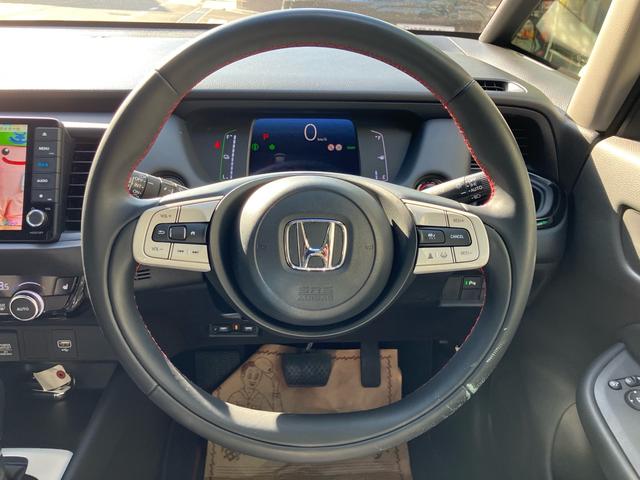 フィット ｅ：ＨＥＶホーム　２０周年特別仕様車　カーサ　純正ナビ　フルセグテレビ　バックカメラ　ＥＴＣ　ＬＥＤヘッドライト　クリアランスソナー　シートヒーター　Ｂｌｕｅｔｏｏｔｈ接続　ドライブレコーダー　オートクルーズコントロール（44枚目）