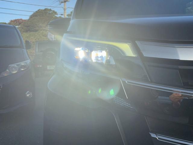 ノア Ｓｉ　ダブルバイビー　ＴＶ＆ナビ　後席モニター　バックカメラ　クルーズコントロール　スマートキー　キーレスエントリー　プッシュスタート　両側電動スライドドア　３列シート　ＬＥＤヘッドライト（65枚目）