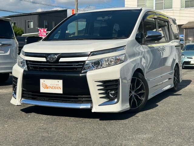 ヴォクシー ZS 煌 全国一年保証・純正ナビ・フルセグTV・フリップダウンモニター・両側電動スライドドア・社外足回り・スマートキー・電動格納ミラー(2枚目)