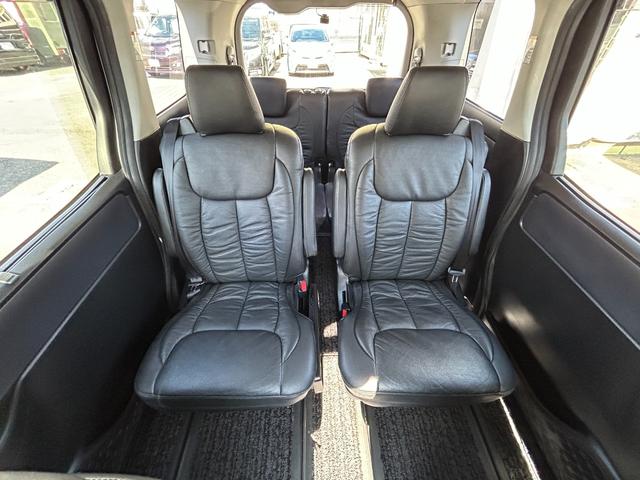 ヴォクシー ZS 煌 全国一年保証・純正ナビ・フルセグTV・フリップダウンモニター・両側電動スライドドア・社外足回り・スマートキー・電動格納ミラー(12枚目)