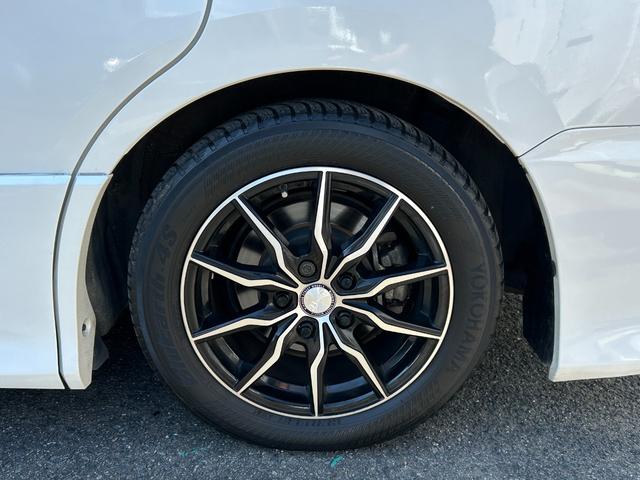 ヴォクシー ZS 煌 全国一年保証・純正ナビ・フルセグTV・フリップダウンモニター・両側電動スライドドア・社外足回り・スマートキー・電動格納ミラー(48枚目)