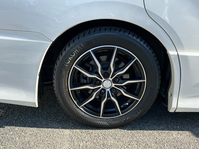 ヴォクシー ZS 煌 全国一年保証・純正ナビ・フルセグTV・フリップダウンモニター・両側電動スライドドア・社外足回り・スマートキー・電動格納ミラー(51枚目)