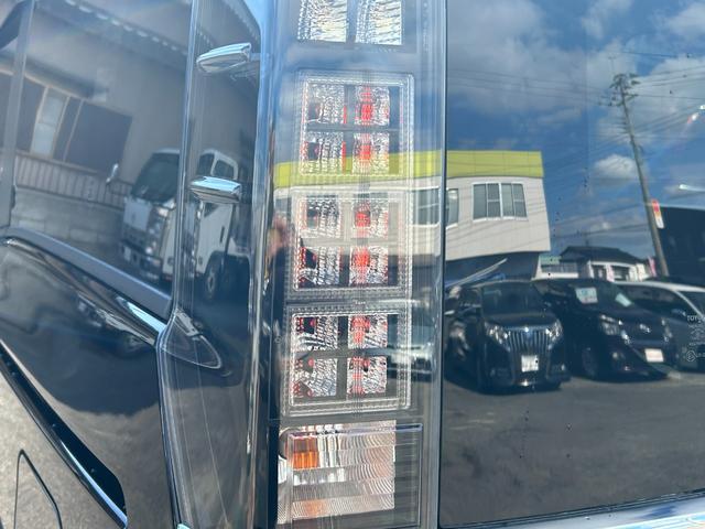 ヴォクシー ＺＳ　煌ＩＩ　全国一年保証・純正ナビ・フルセグＴＶ・フリップダウンモニター・両側電動スライドドア・スマートキー・電動格納ミラー・純正アルミホイール（34枚目）