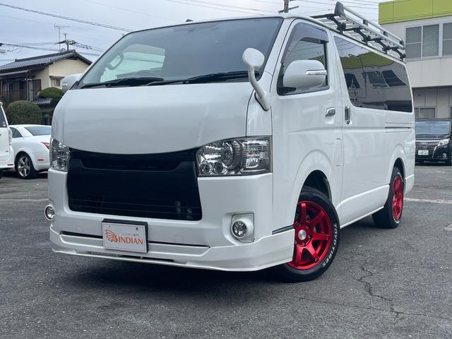 ハイエースバン スーパーＧＬ　ダークプライム　全国一年保証・純正ナビ・ＴＶ・バックカメラ・Ｂｌｕｅｔｏｏｔｈ・スマートキー・プッシュスタート・シートカバー・ＥＴＣ・社外テールライト・エアロ・社外１７インチアルミ・リアラダー・ルーフキャリア（2枚目）