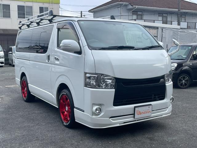 ハイエースバン スーパーＧＬ　ダークプライム　全国一年保証・純正ナビ・ＴＶ・バックカメラ・Ｂｌｕｅｔｏｏｔｈ・スマートキー・プッシュスタート・シートカバー・ＥＴＣ・社外テールライト・エアロ・社外１７インチアルミ・リアラダー・ルーフキャリア（4枚目）