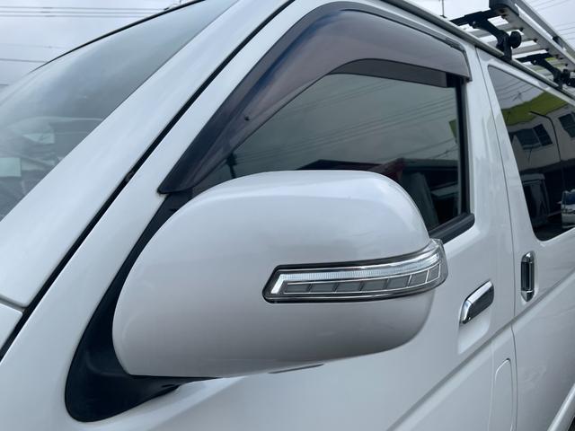 ハイエースバン スーパーＧＬ　ダークプライム　全国一年保証・純正ナビ・ＴＶ・バックカメラ・Ｂｌｕｅｔｏｏｔｈ・スマートキー・プッシュスタート・シートカバー・ＥＴＣ・社外テールライト・エアロ・社外１７インチアルミ・リアラダー・ルーフキャリア（35枚目）