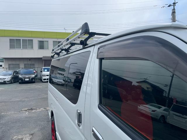 ハイエースバン スーパーＧＬ　ダークプライム　全国一年保証・純正ナビ・ＴＶ・バックカメラ・Ｂｌｕｅｔｏｏｔｈ・スマートキー・プッシュスタート・シートカバー・ＥＴＣ・社外テールライト・エアロ・社外１７インチアルミ・リアラダー・ルーフキャリア（37枚目）